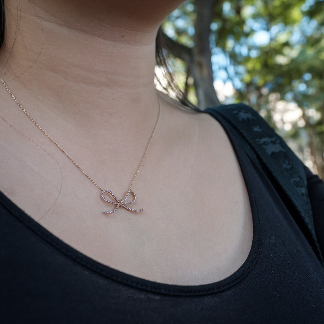 Rose gold hot sale bow necklace